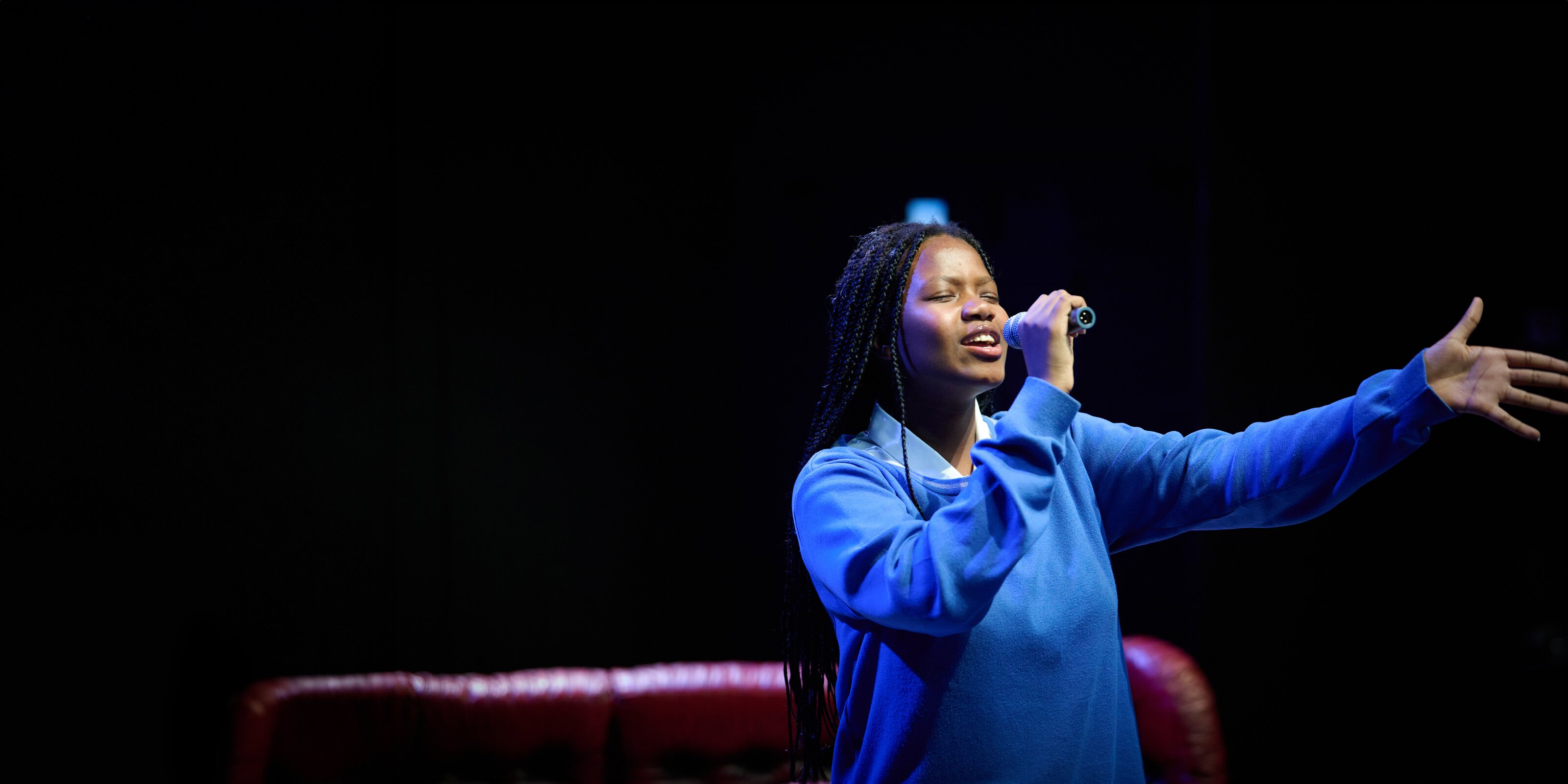 student singing