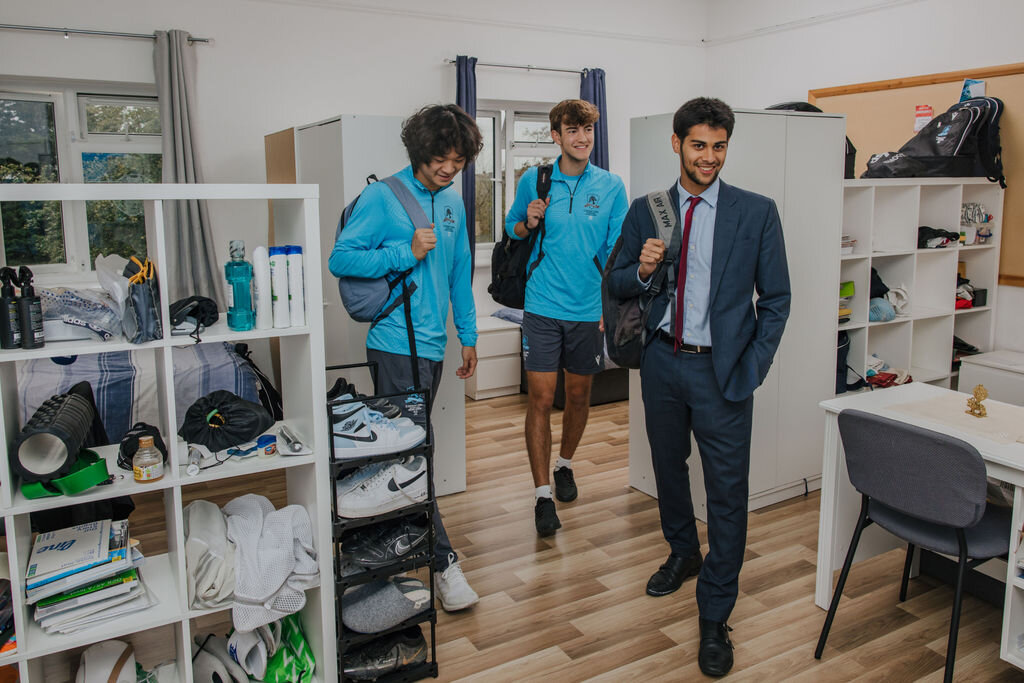 three students in the classroom