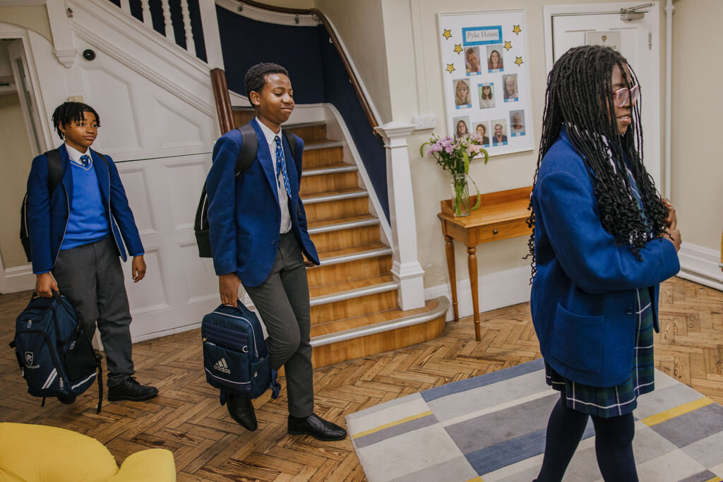 three students walking 
