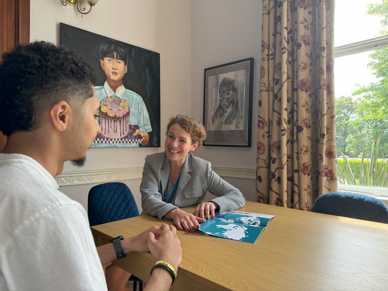 teacher and student talking 
