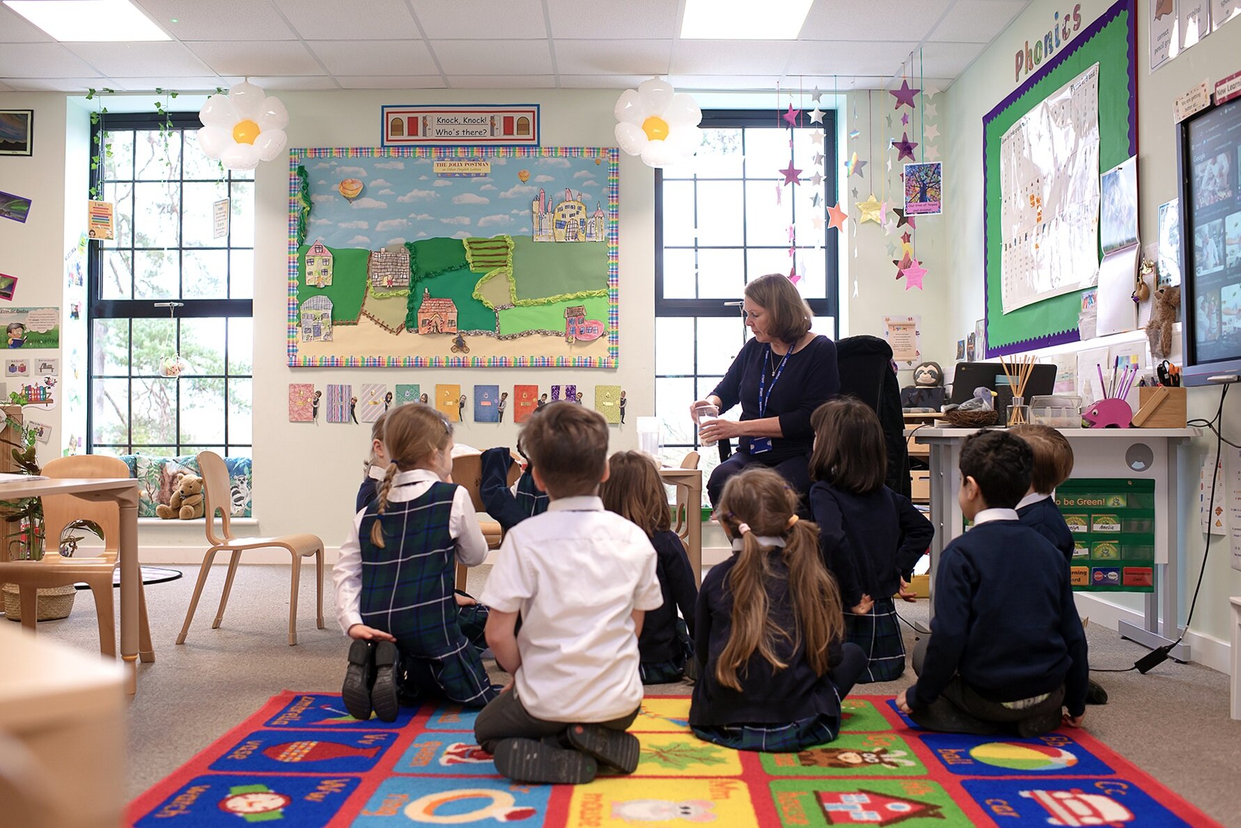 teacher and students in the classroom