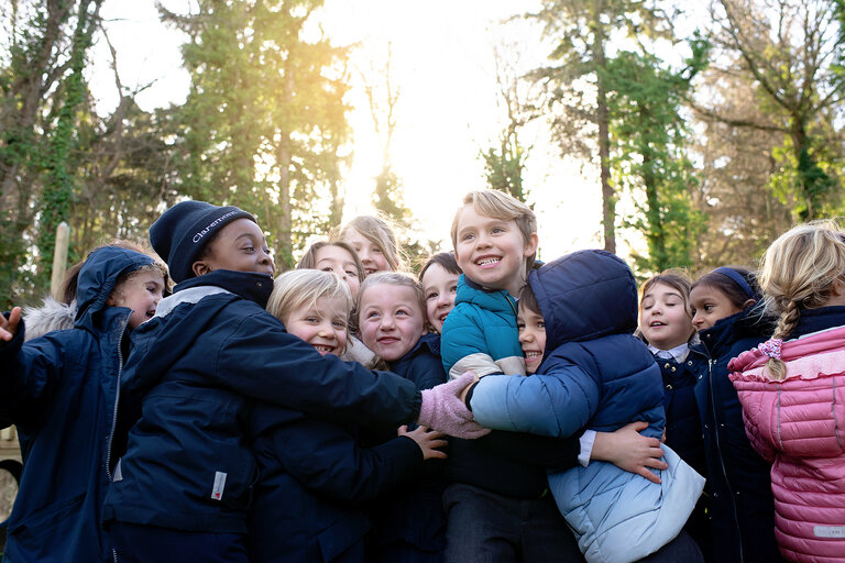 students hugging each other