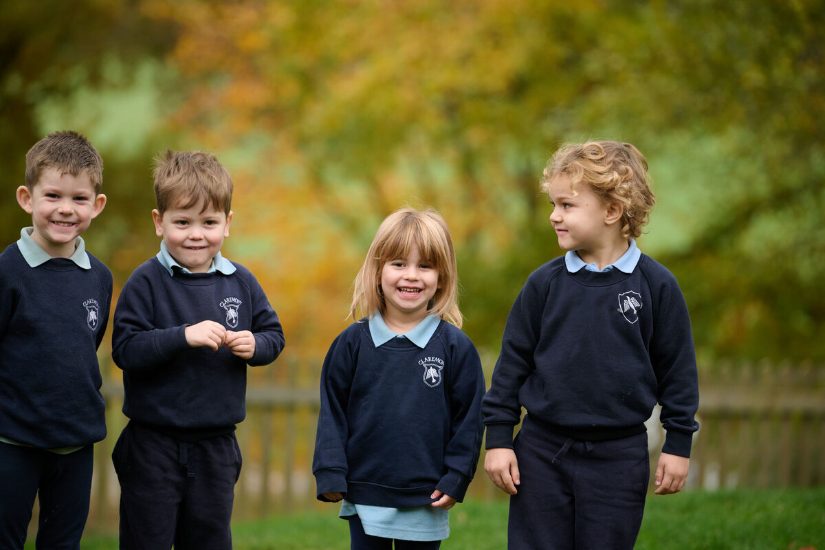 four students smiling 