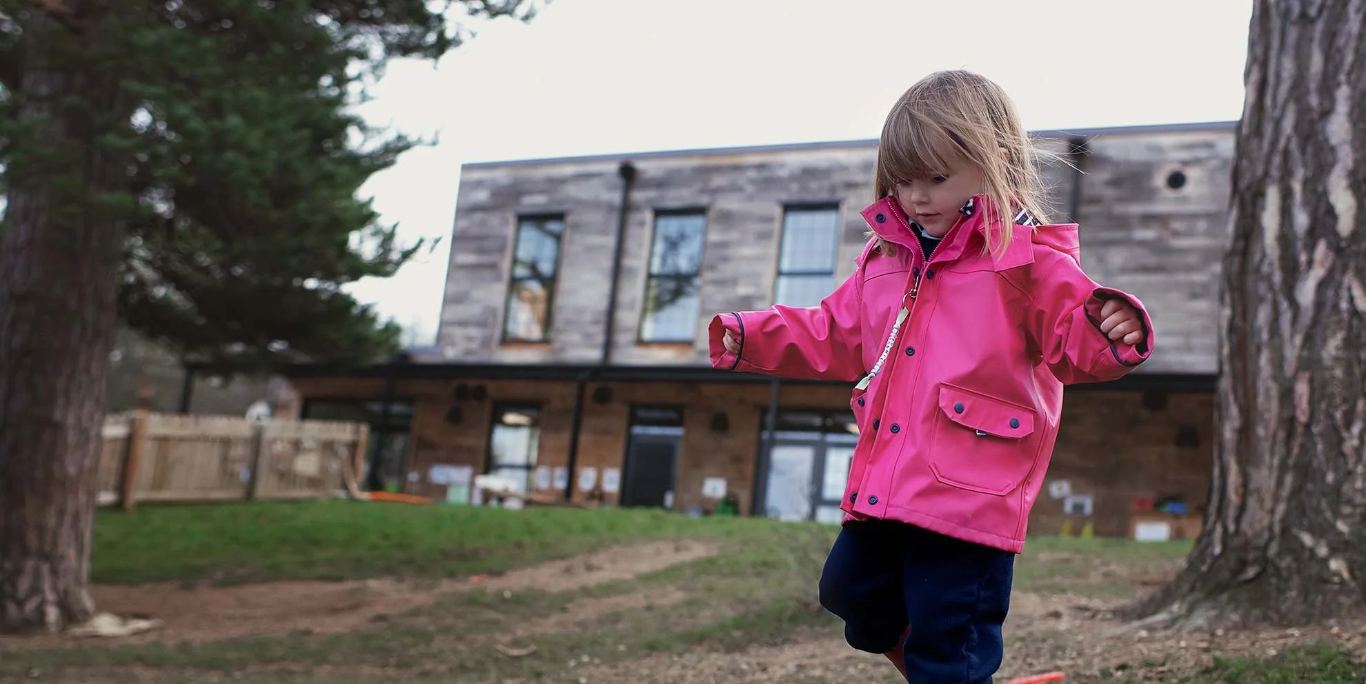 a student playing in the schoolyard
